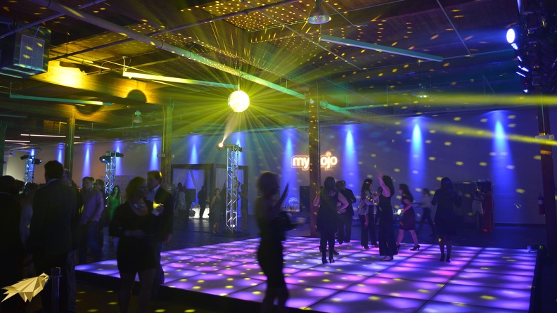 The mirror ball is taking a blast from our golden spot lights and dispersing light all around the room while our LED Dance Floor flows between shades of purple and blue. This client had a special color scheme in mind and it came out perfectly! led dance floor with mirrorball event.JPG