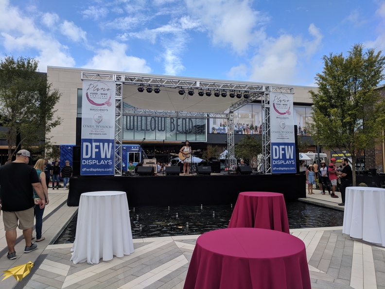 This 24'x20' stage with shade roof included lighting and audio rental for an elegant marketing event. Banners and location made for a remarkable setup for attendees! IMG_20181006_121036.jpg
